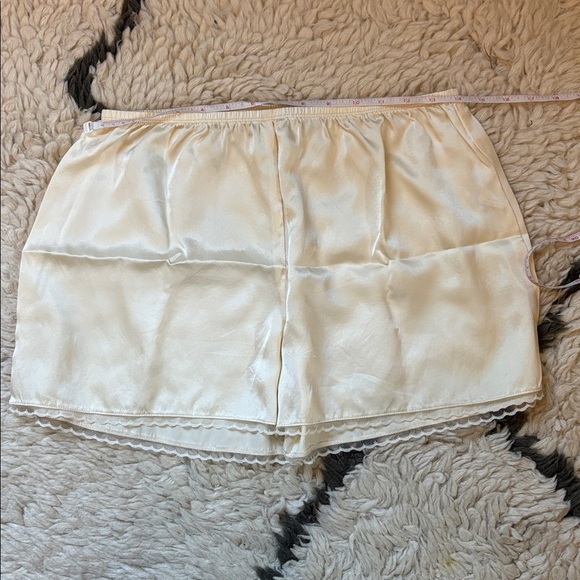 DONNI. Silk Tap Shorts in Light Yellow - Picture 14 of 17